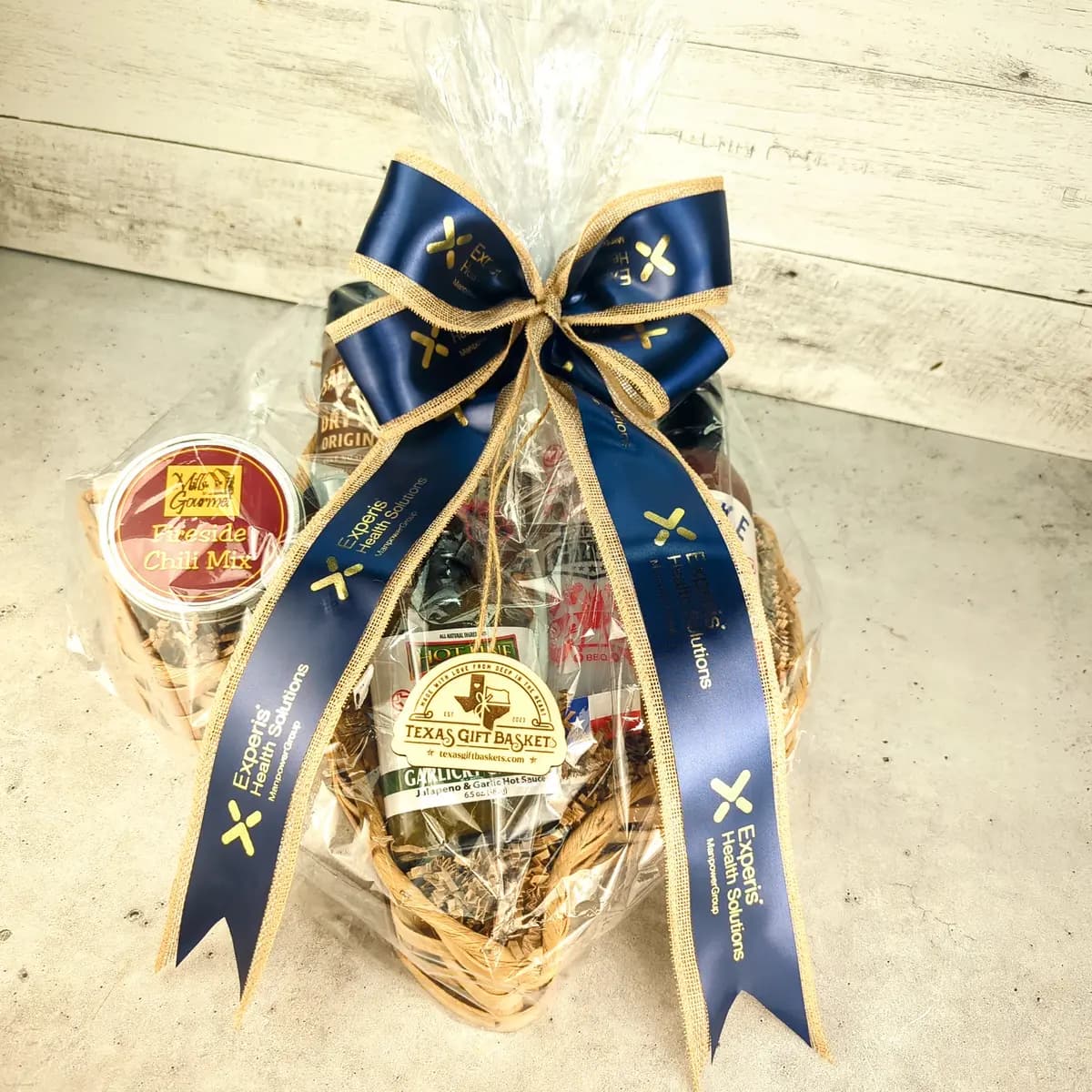 Experis Health Solutions Texas gift basket finished with custom printed ribbon